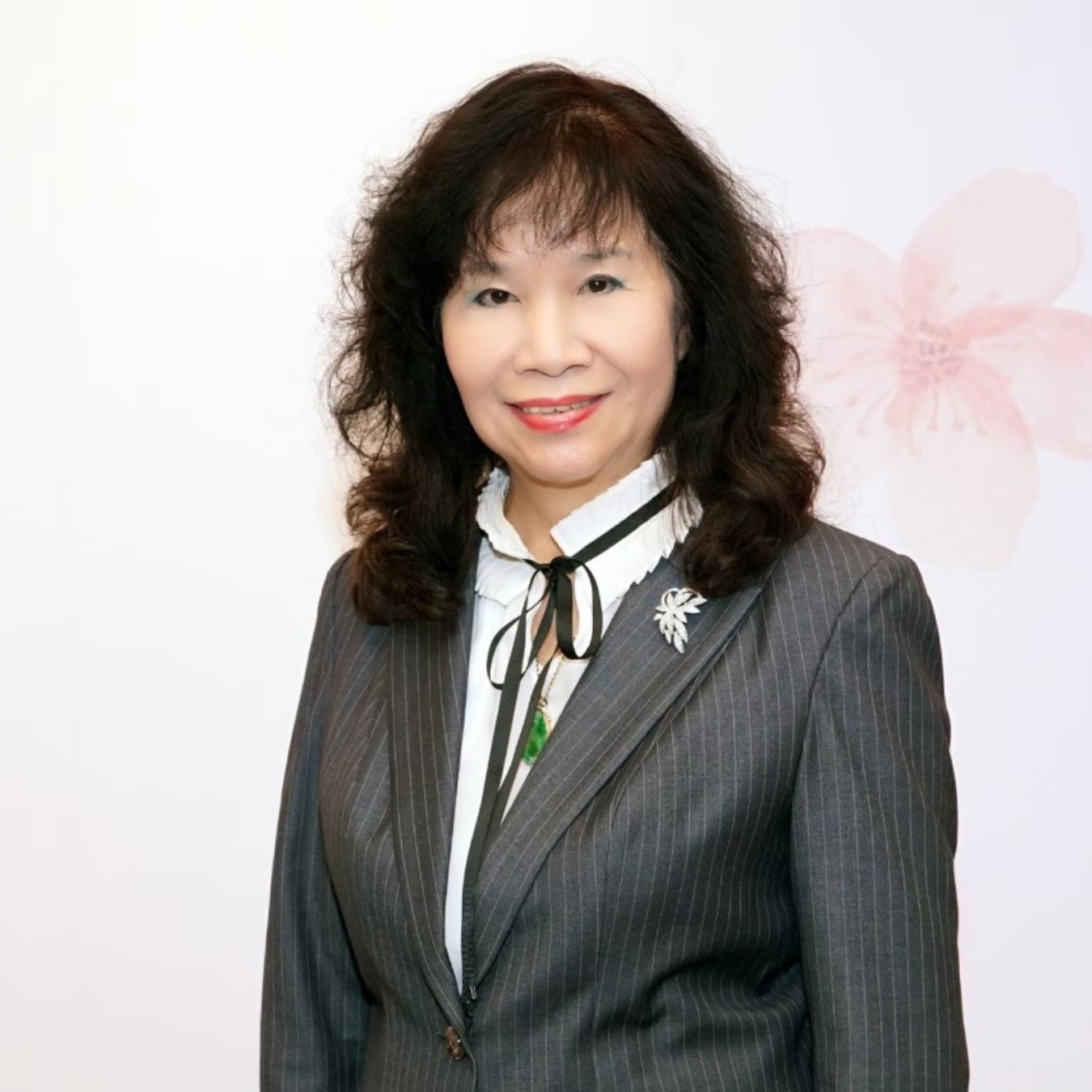 副理事長 何麗華